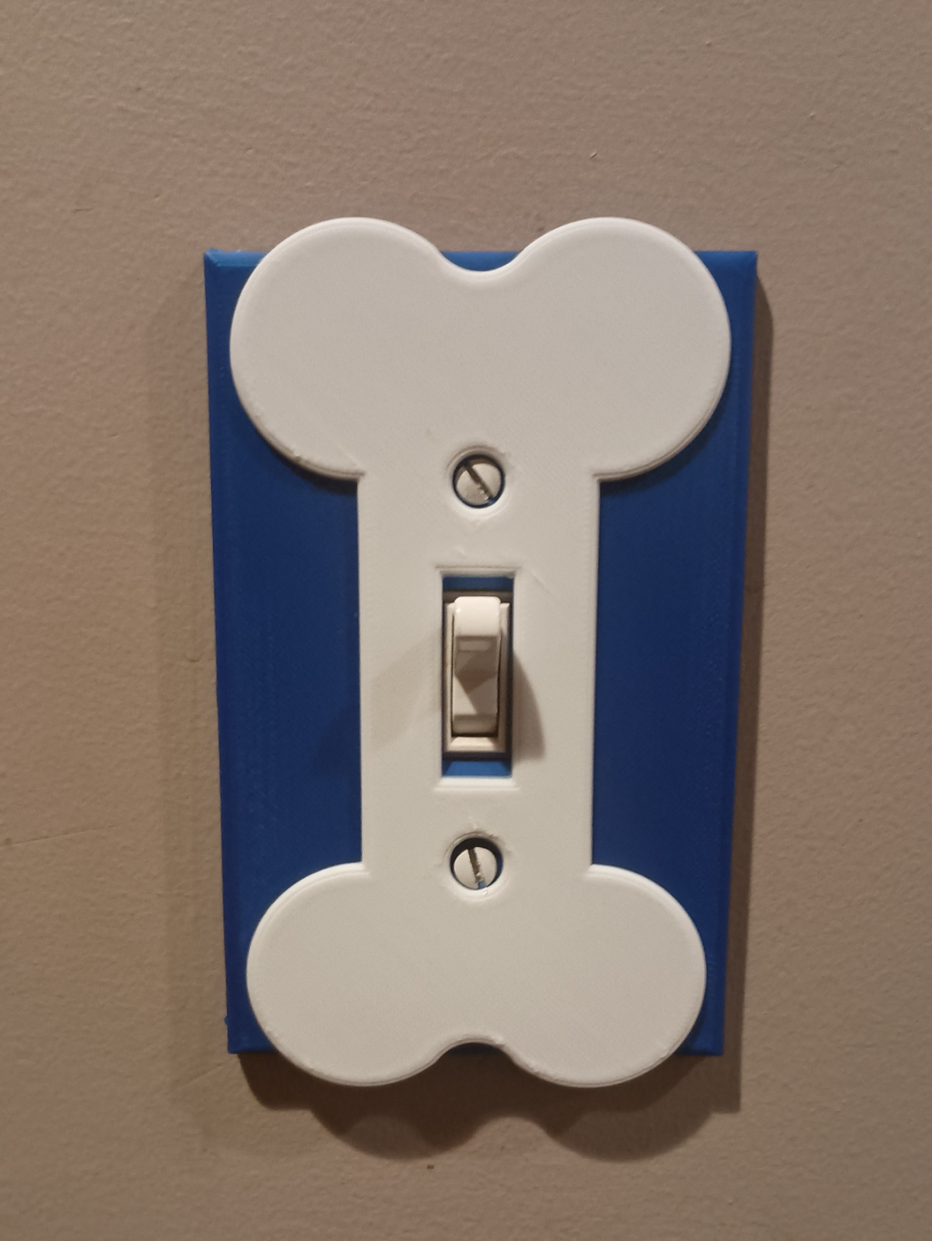 Dogbone switch cover