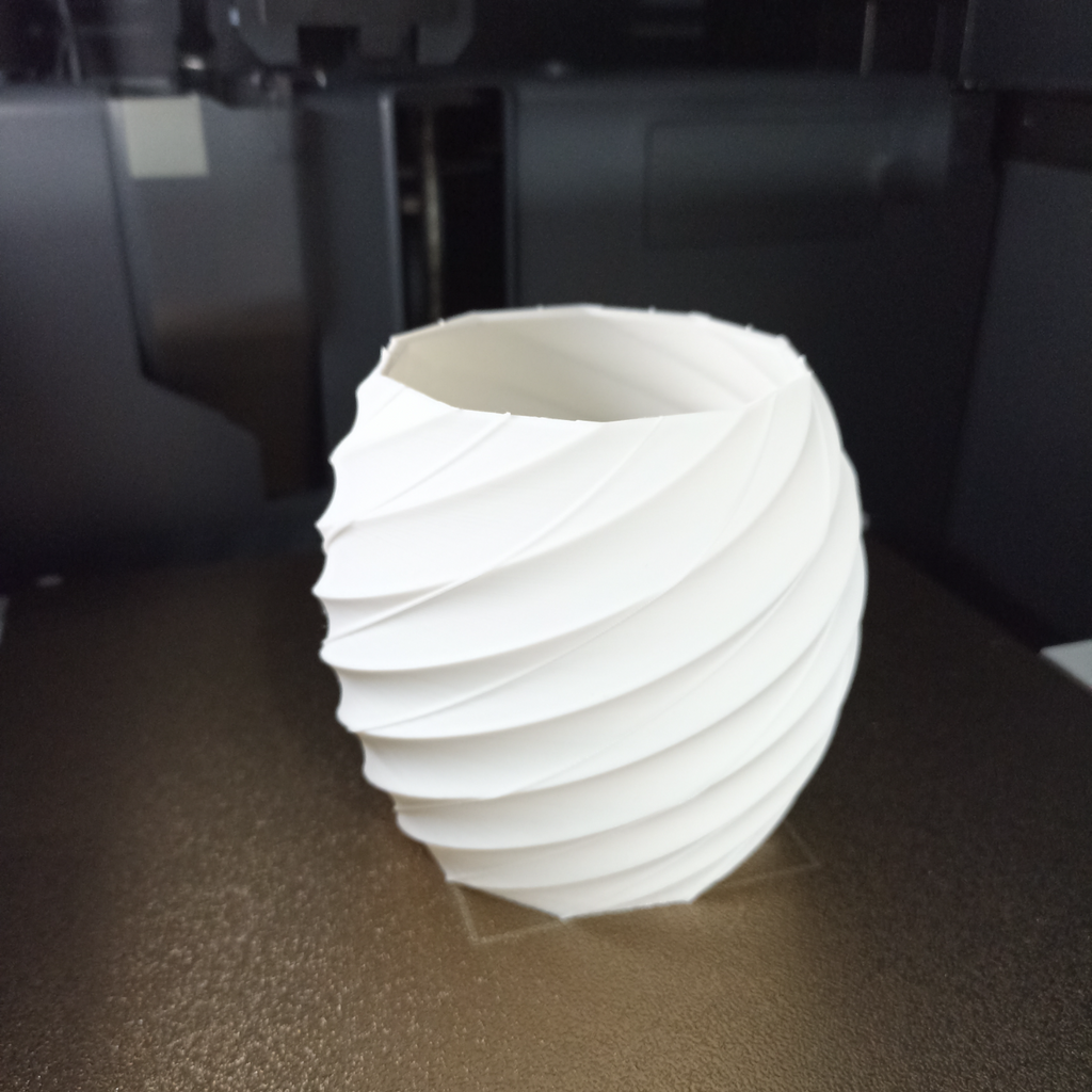 Toothbrush holder and mini flower pot.