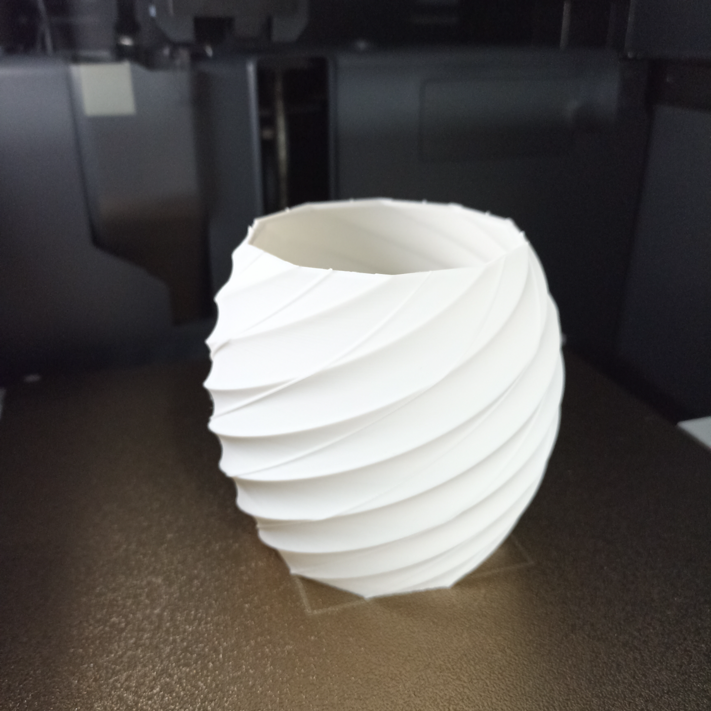 Toothbrush holder and mini flower pot.