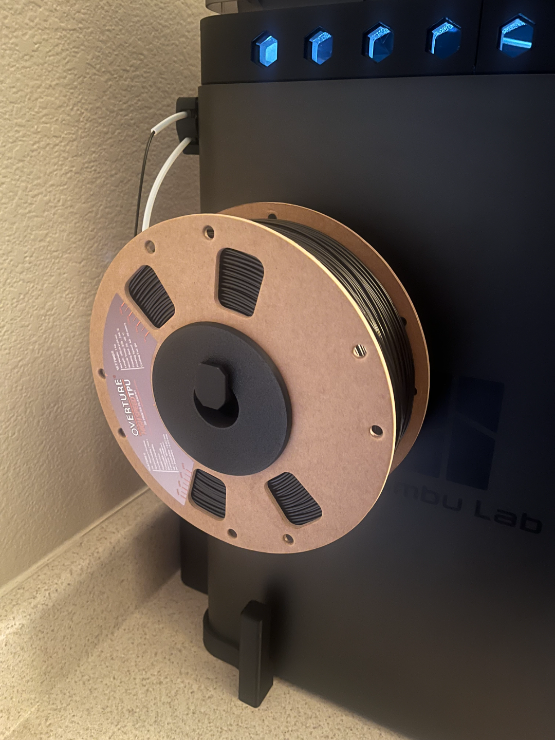 Overture spool adaptor for side spool mount