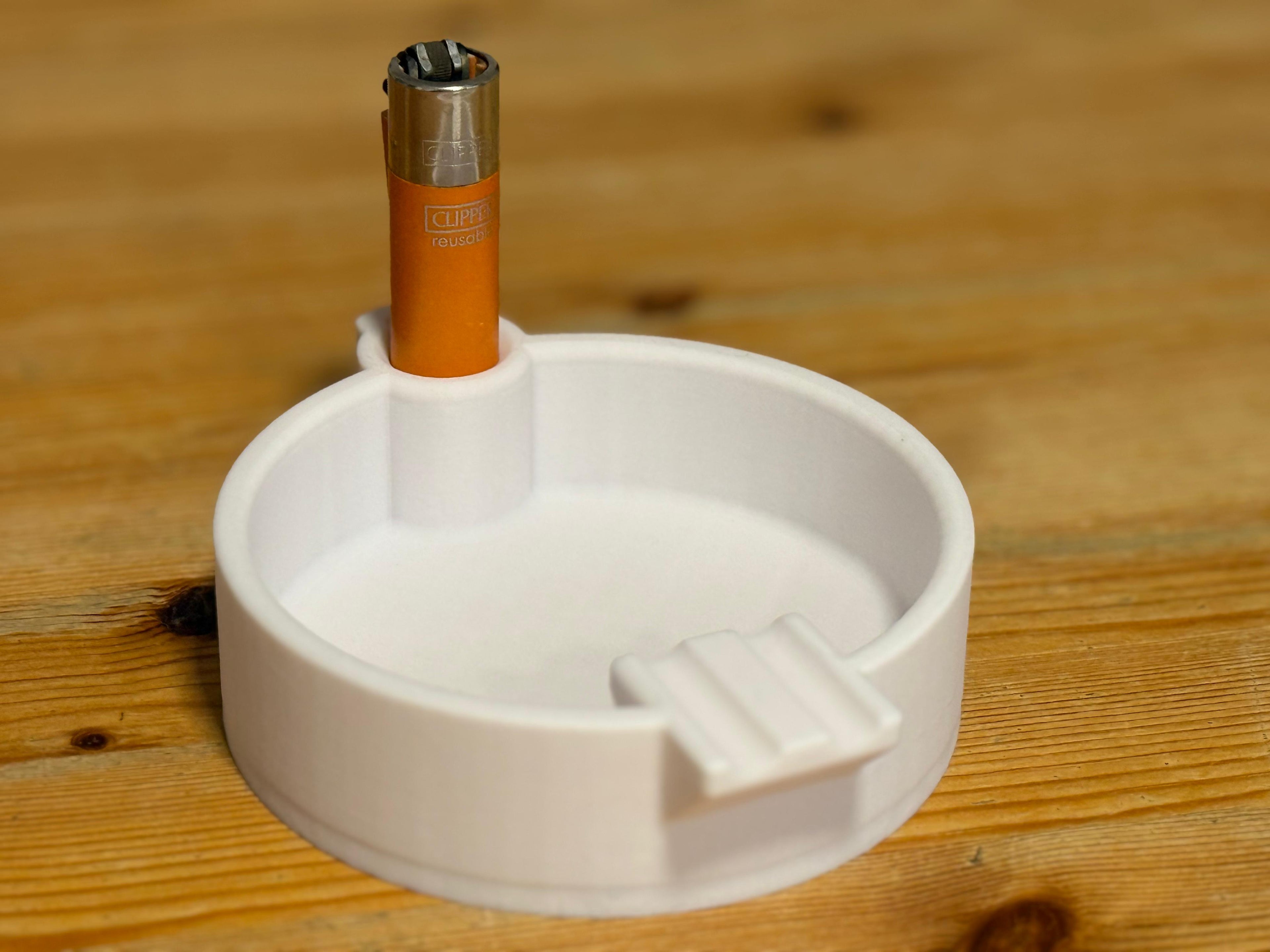 ASHTRAY with a clipper holder
