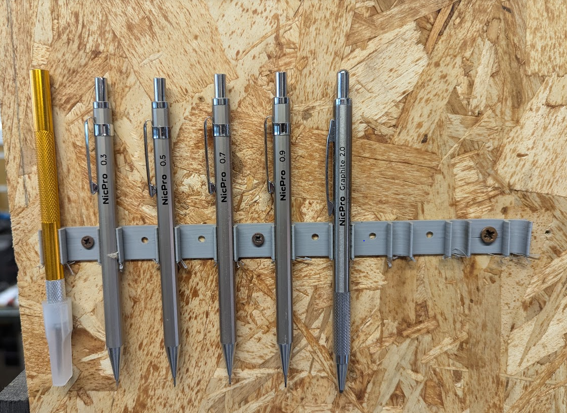 Wall-Mounted Pen and Tool Holder