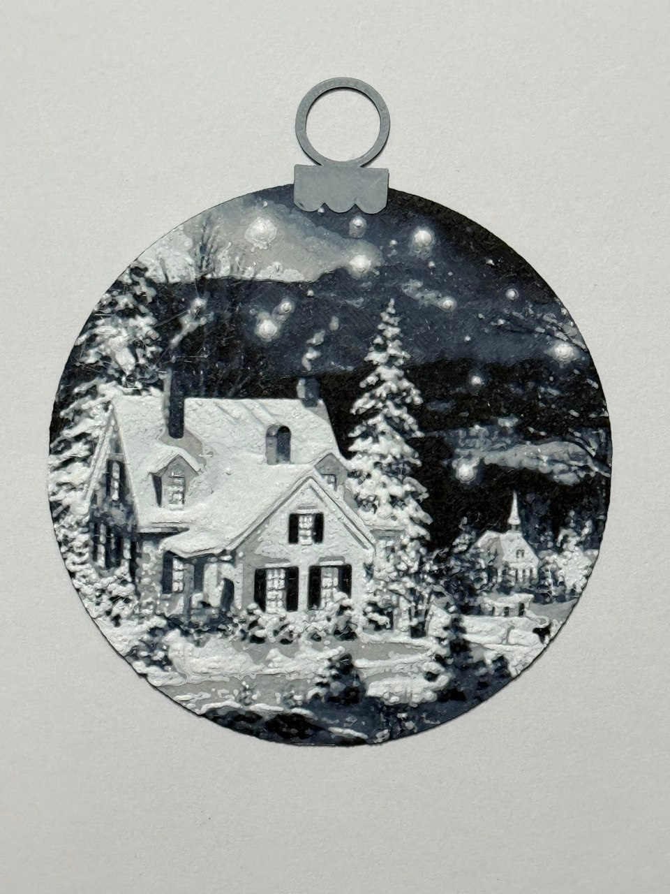 Christmas ball of a snowy night landscape