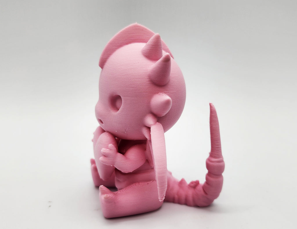Cute Sitting Dragon with Heart Figure