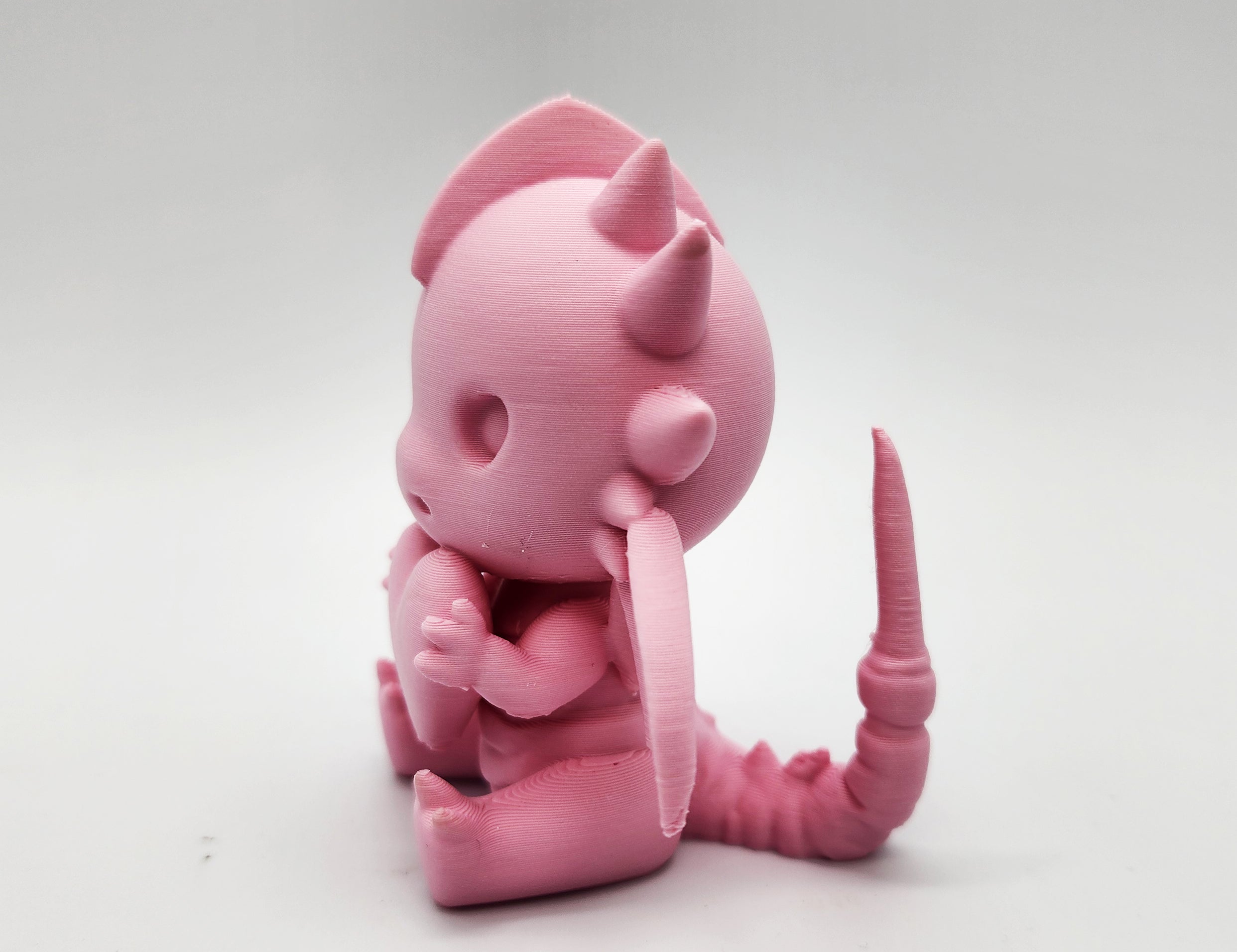 Cute Sitting Dragon with Heart Figure