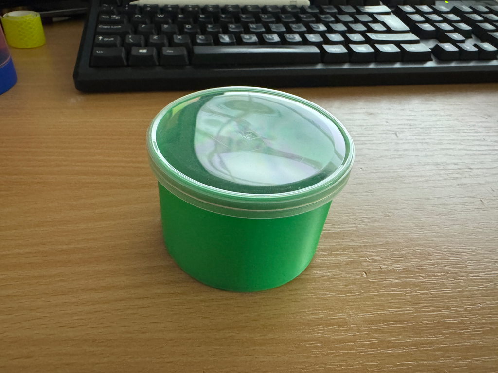 Storage container - uses Pringles lid
