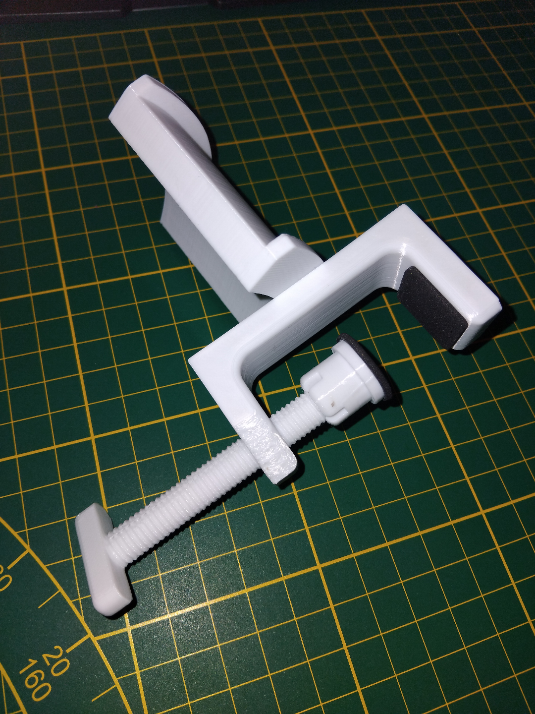 Clamp-on headphone holder