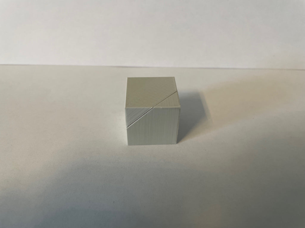 Sliced cube with screw as joint