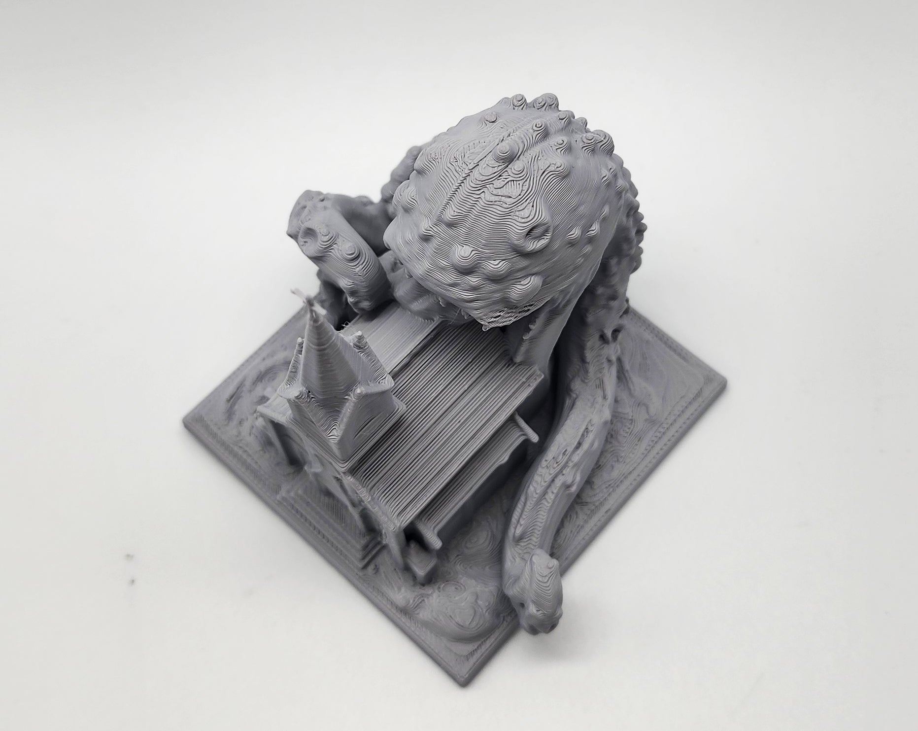 Cosmic Horror eating a Church Miniature