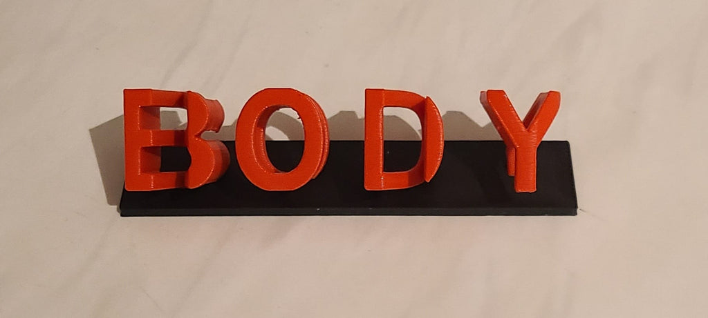 Spiegel-Text "BODY" und "MIND"