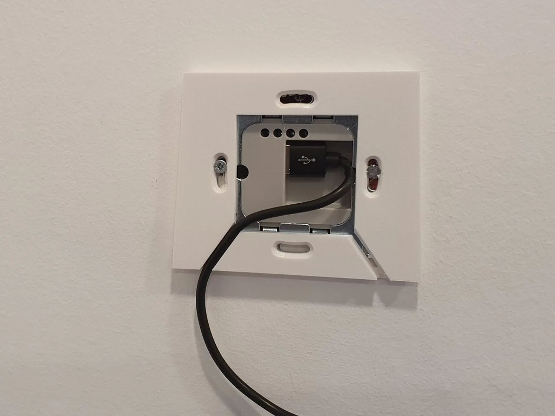 Floating tablet wall mount with charger support