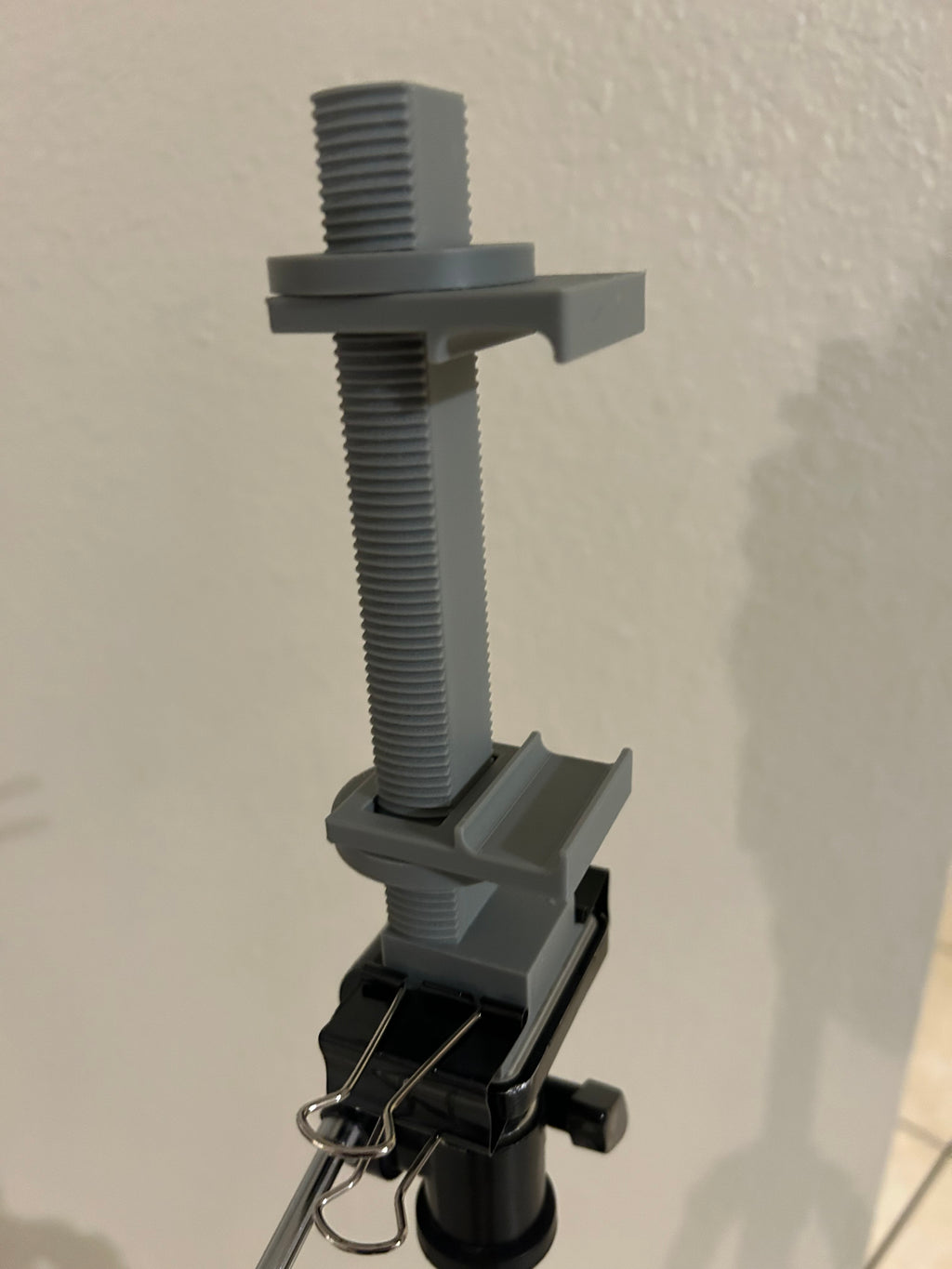 Universal phone holder for tripod(uses gator clip)