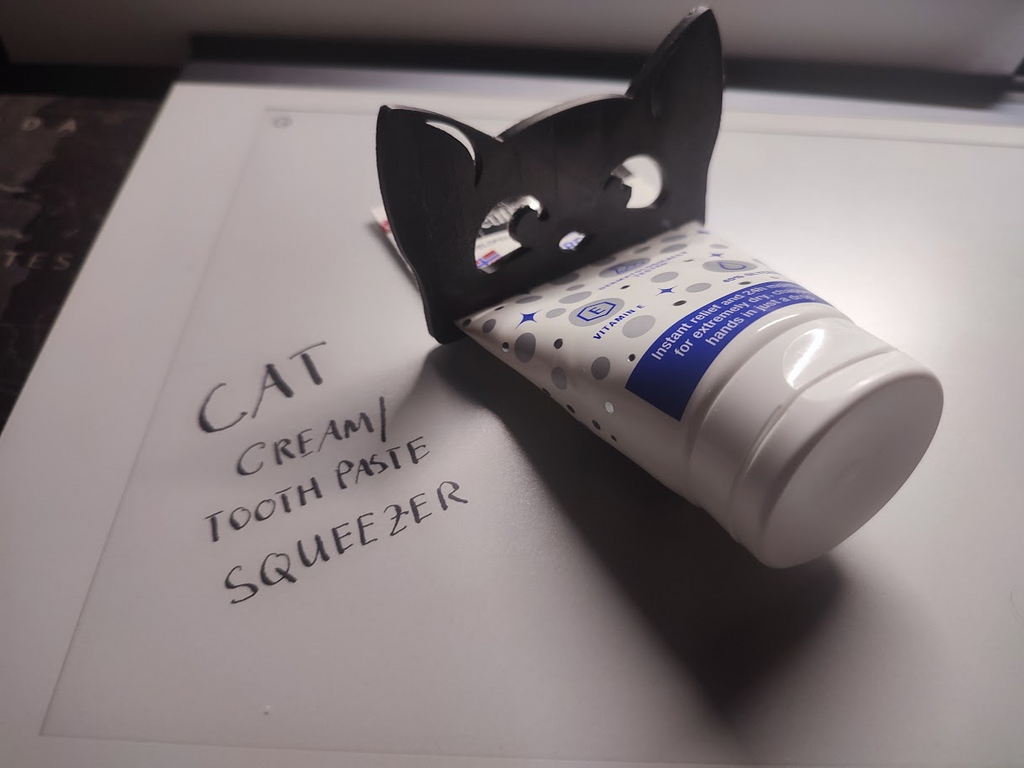 Cat design cream or toothpaste squeezer
