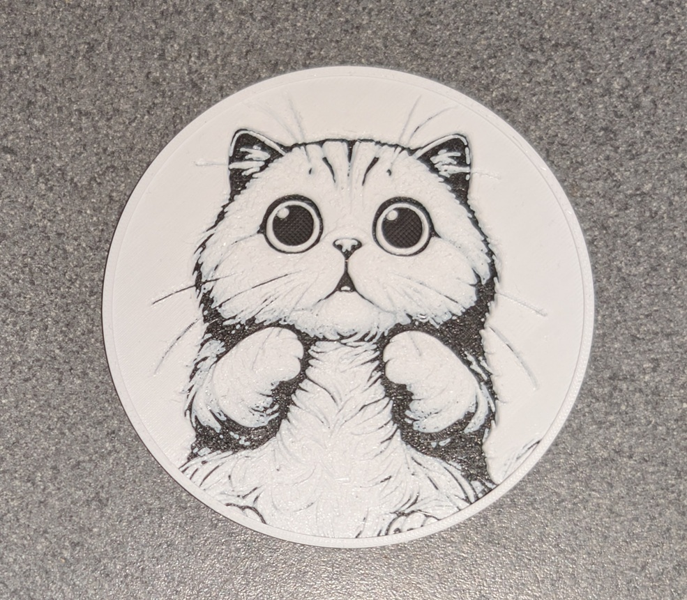 Wide eyed cute cat coaster