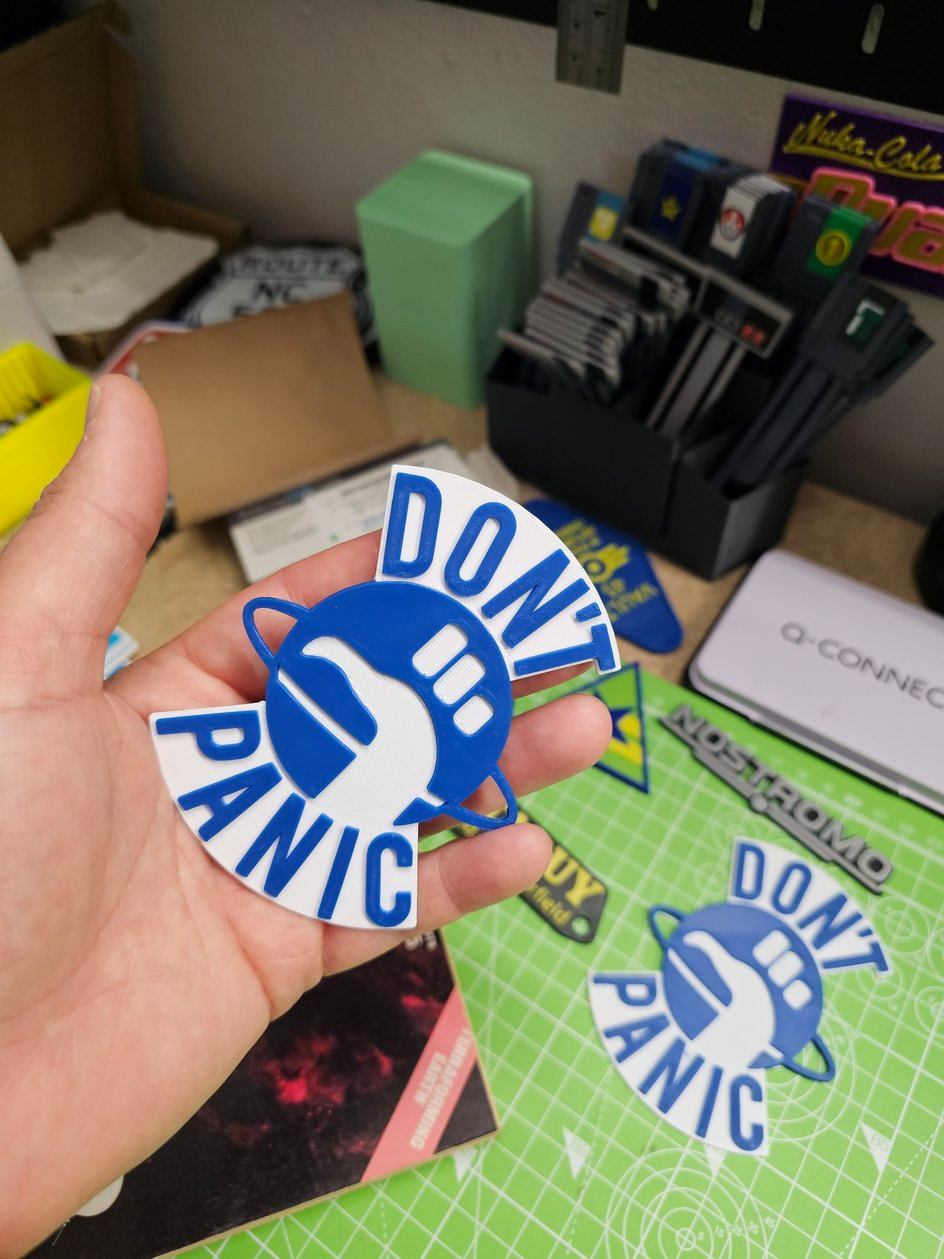 Don't Panic Hitchiker guide inspired wall badge