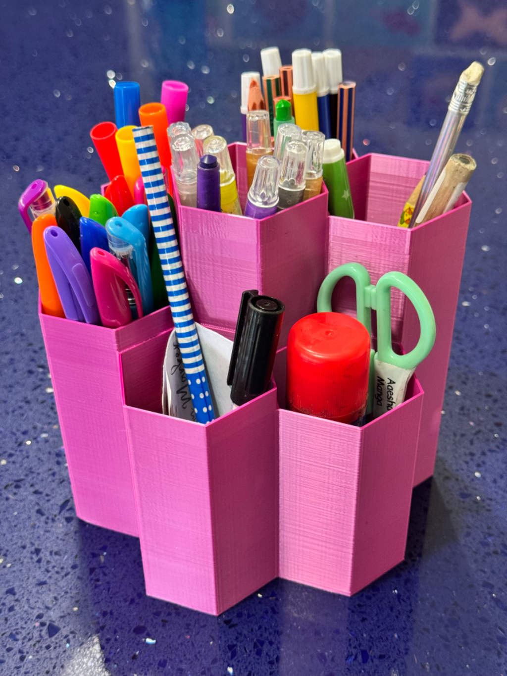Hexagonal multi-tired desk organiser