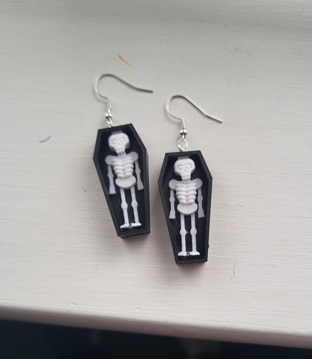 skeleton in coffin earring
