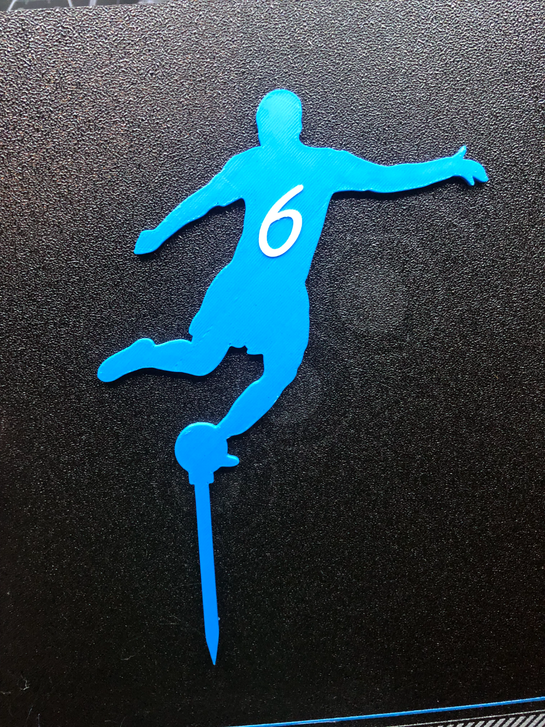 Footballer cake topper