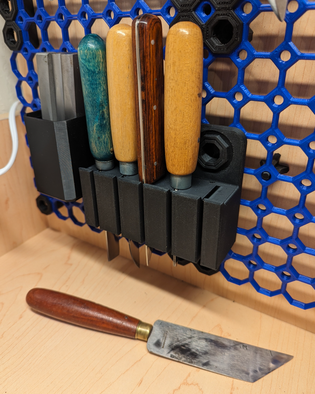 Multiboard Knife Rack for leatherworking knives.