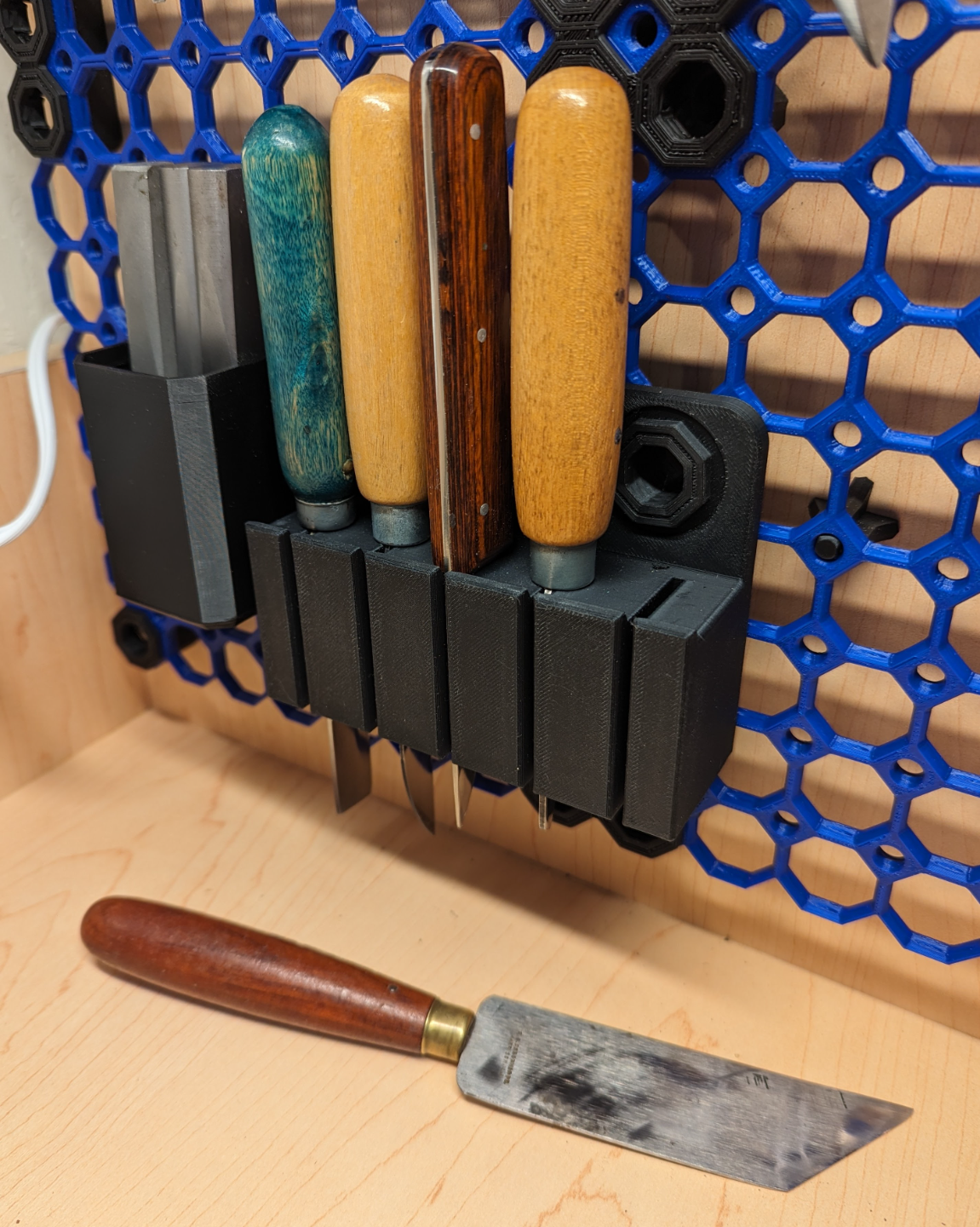 Multiboard Knife Rack for leatherworking knives.