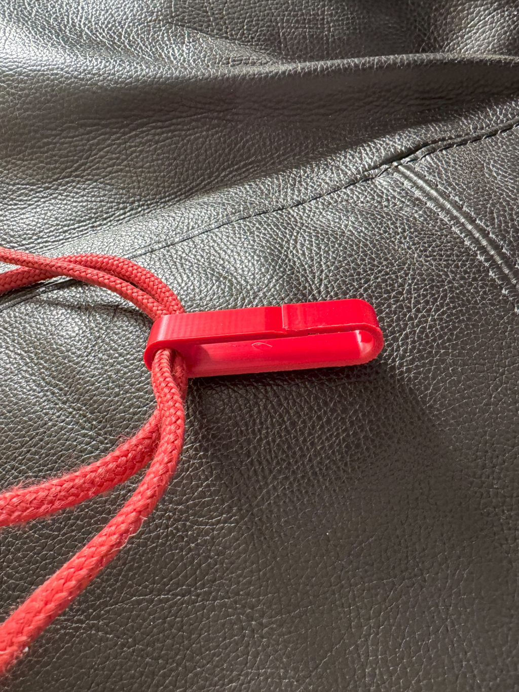 Clip for backpacks with strings