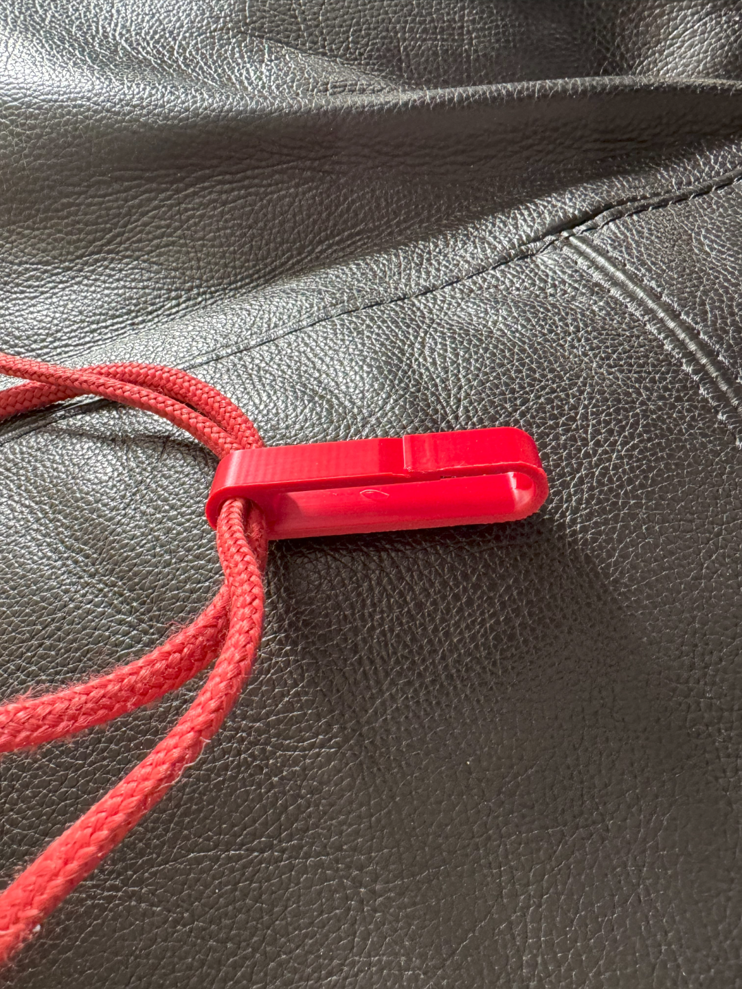 Clip for backpacks with strings