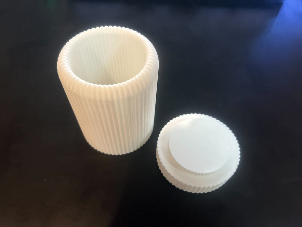 Toothbrush cup with removable bottom