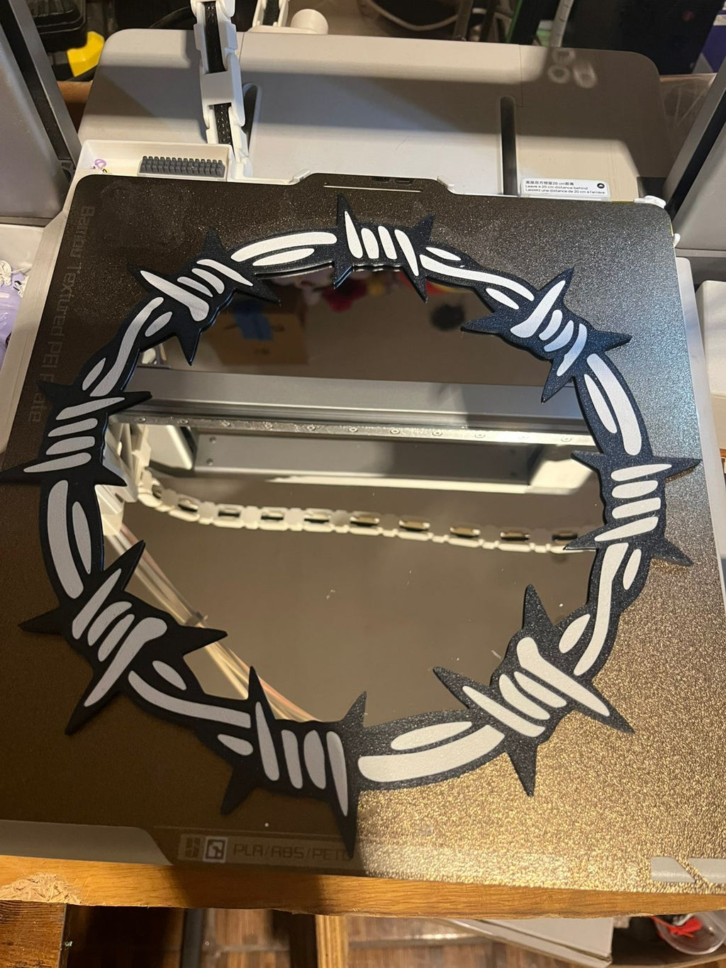 Barbed wire mirror