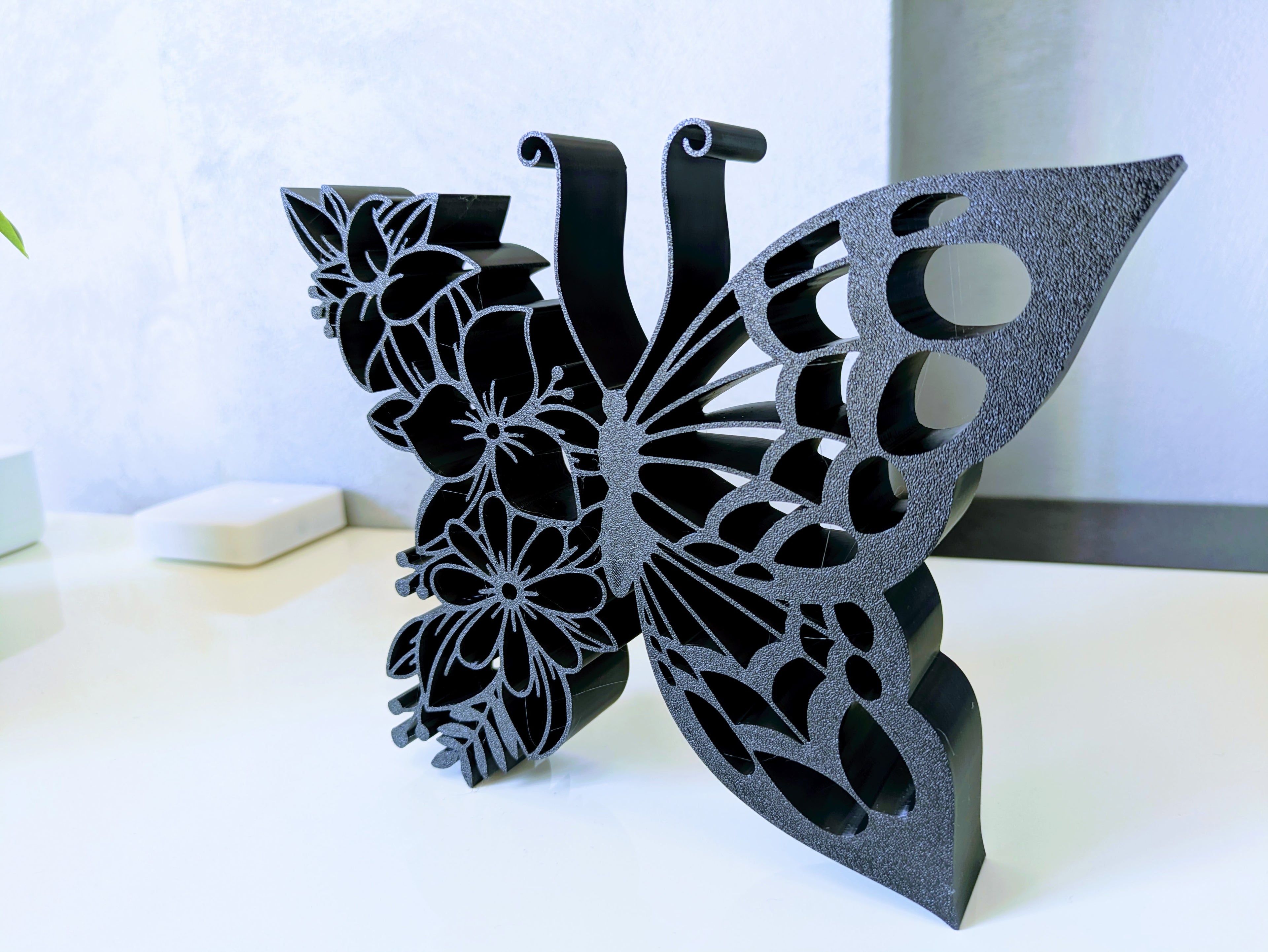Floral butterfly ornament