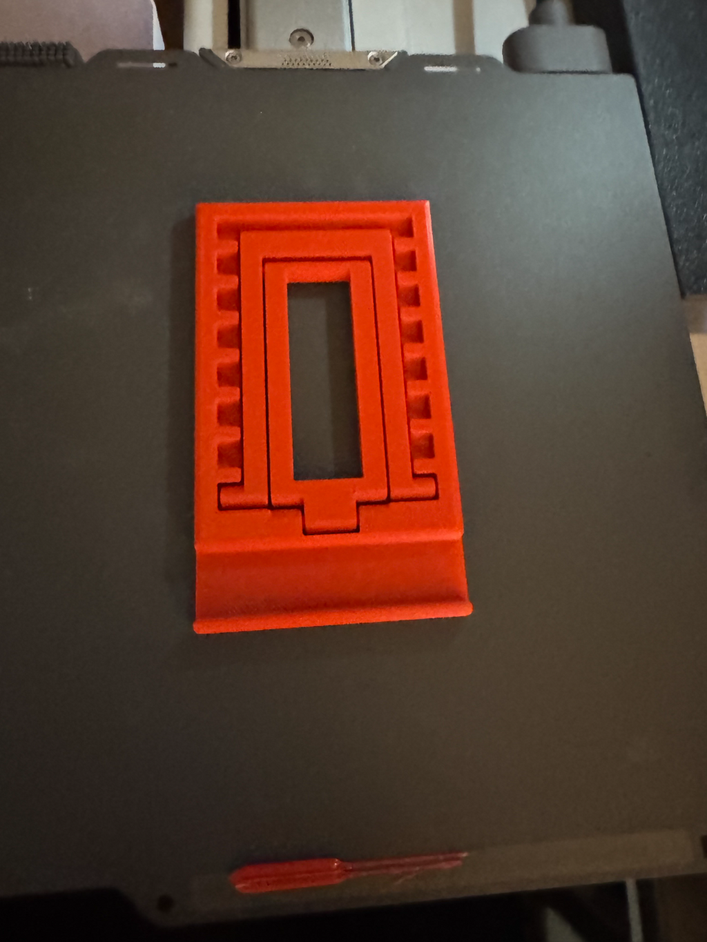 Adjustable folding phone stand (print in place)