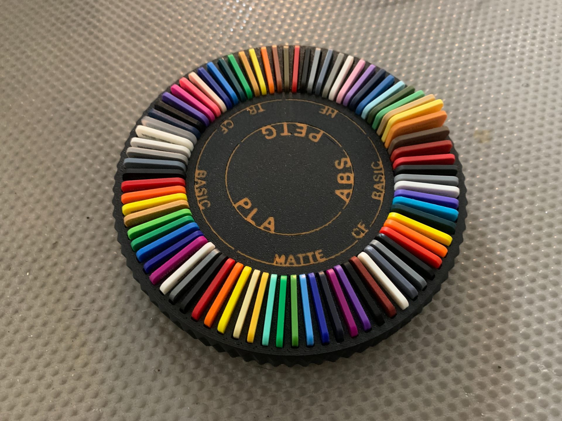 NEW SWATCHES Spinning filament display with names