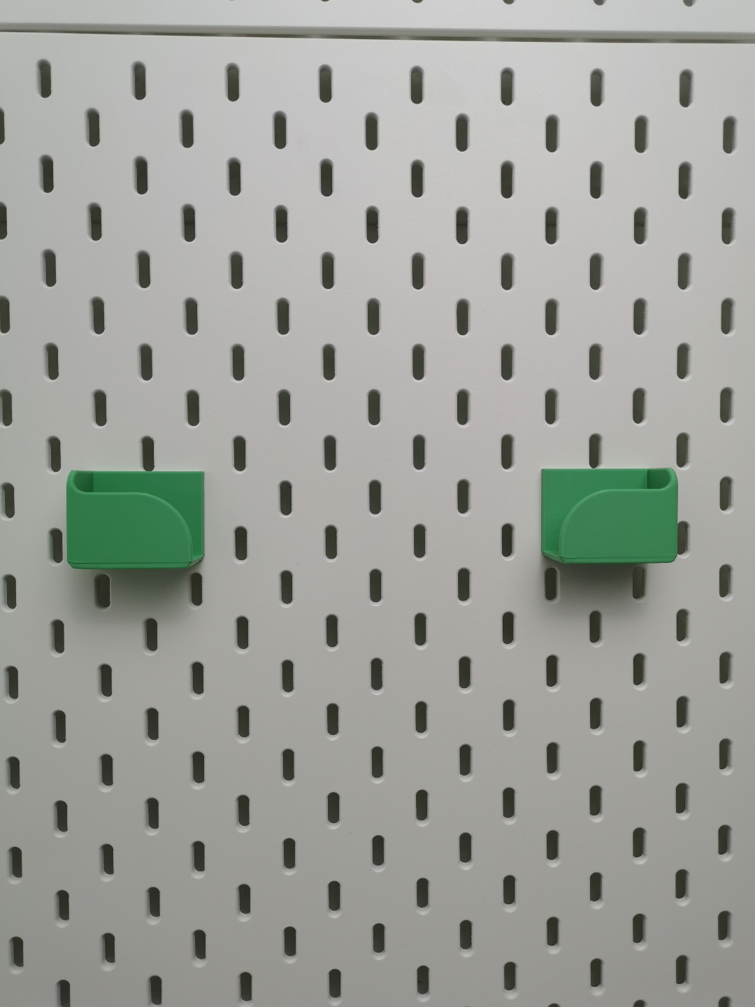 Skadis Trixig spirit level holder