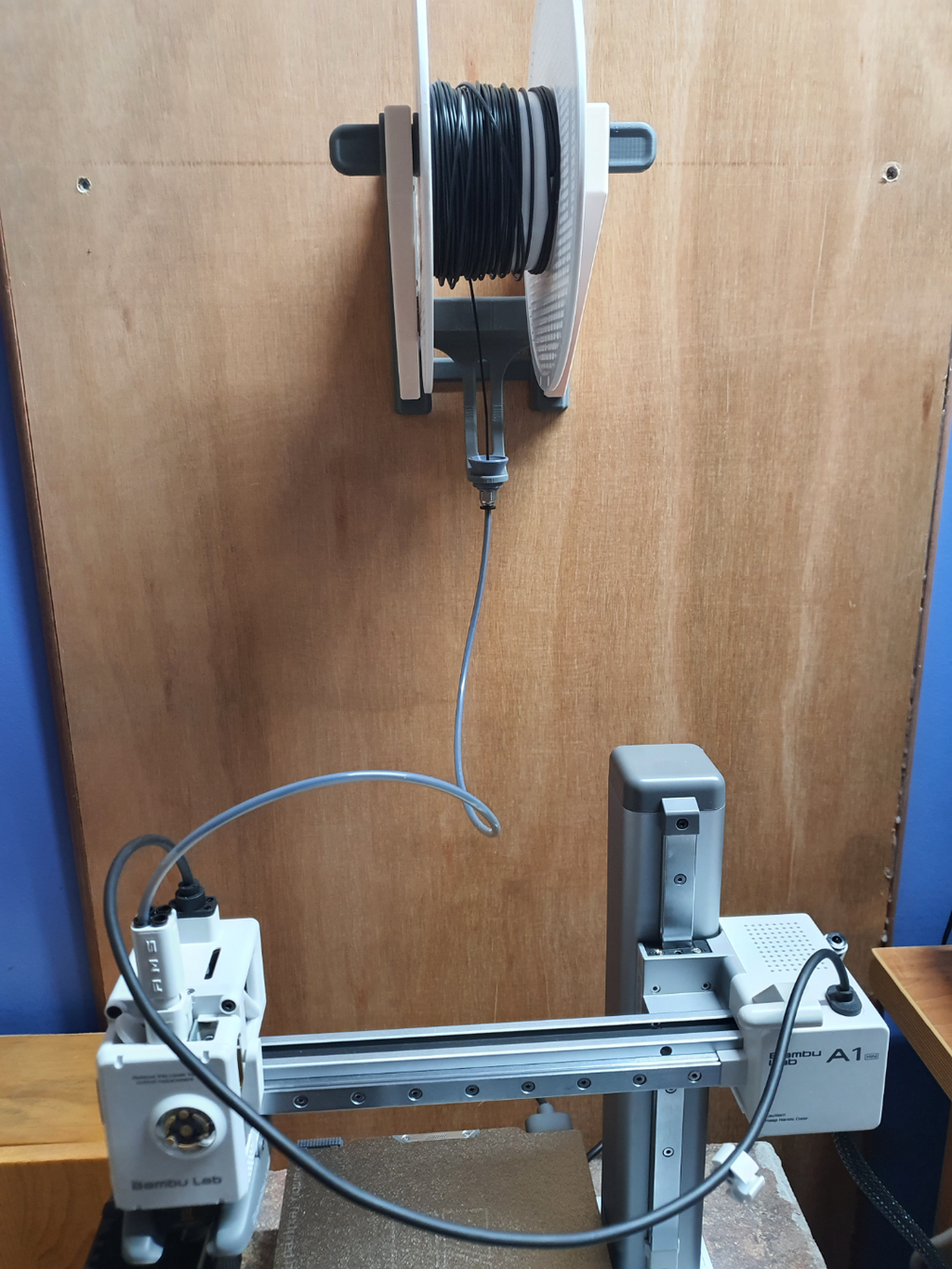 Spool Holder for Bare and Honeycomb Storage Wall
