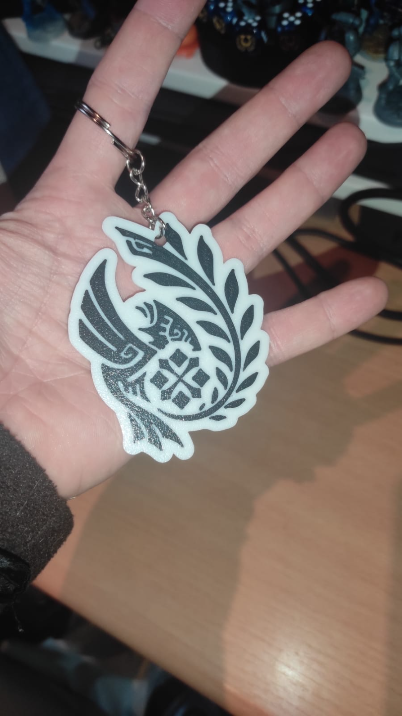 Monster Hunter Wilds logo keychain