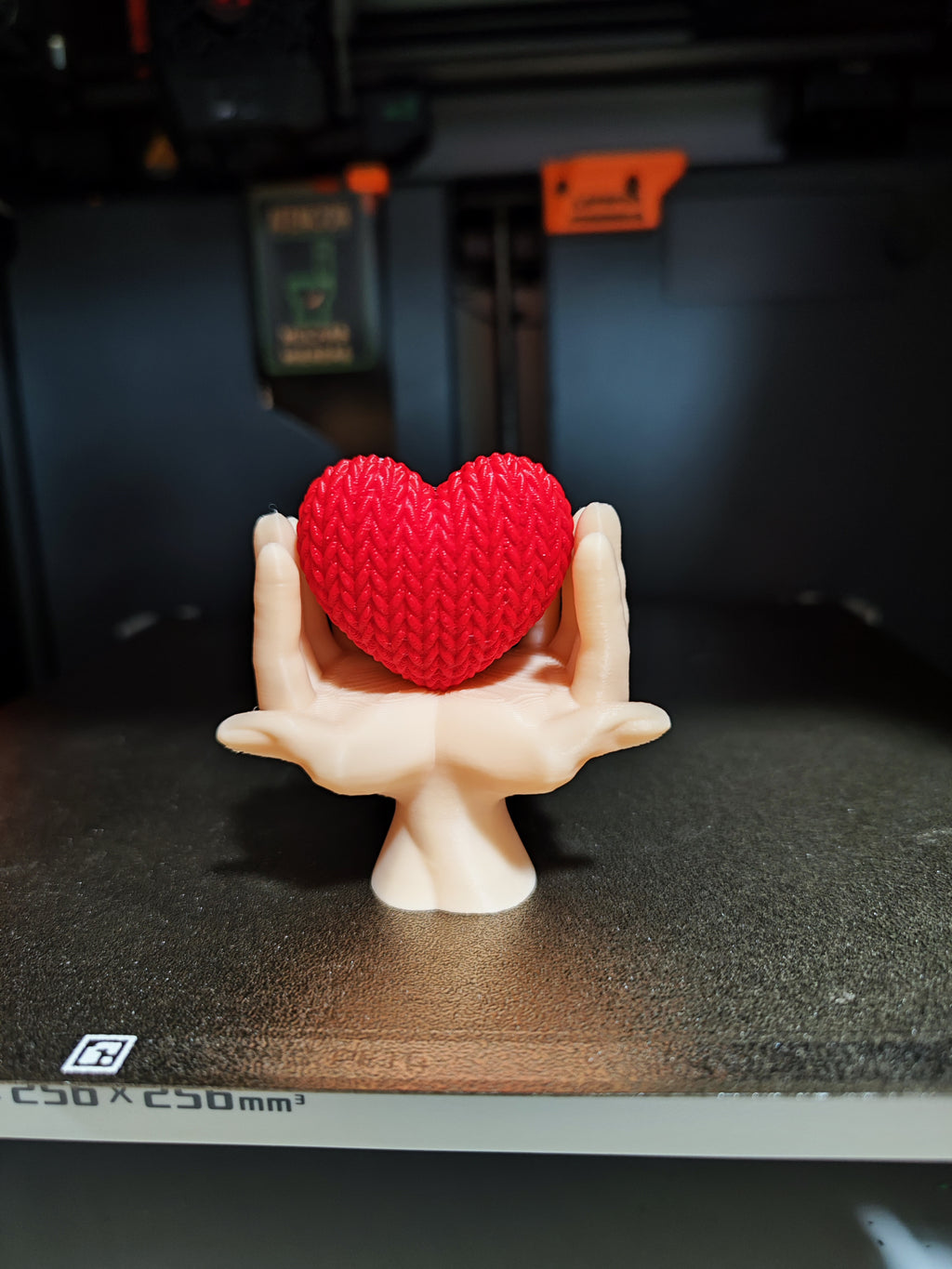 Heart knitted in hands