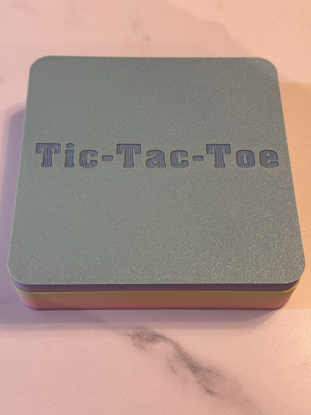 Tic-Tac-Toe game with storage container
