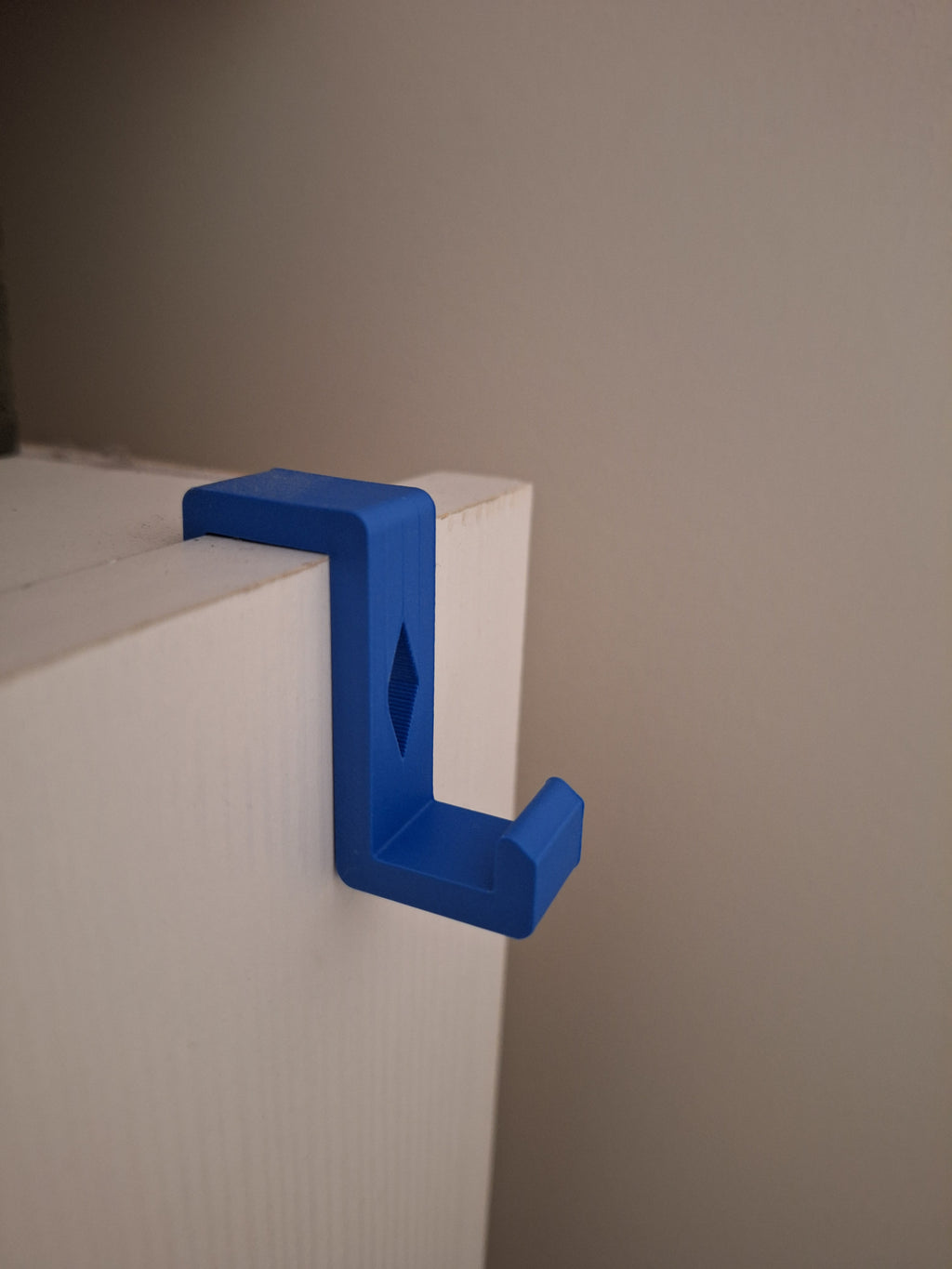 Simple closet edge hook