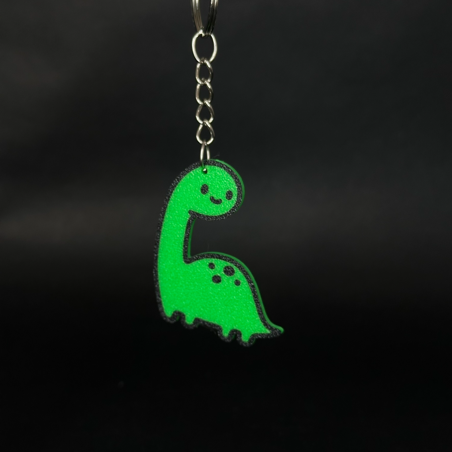 Smiling dinosaur green keychain + ams
