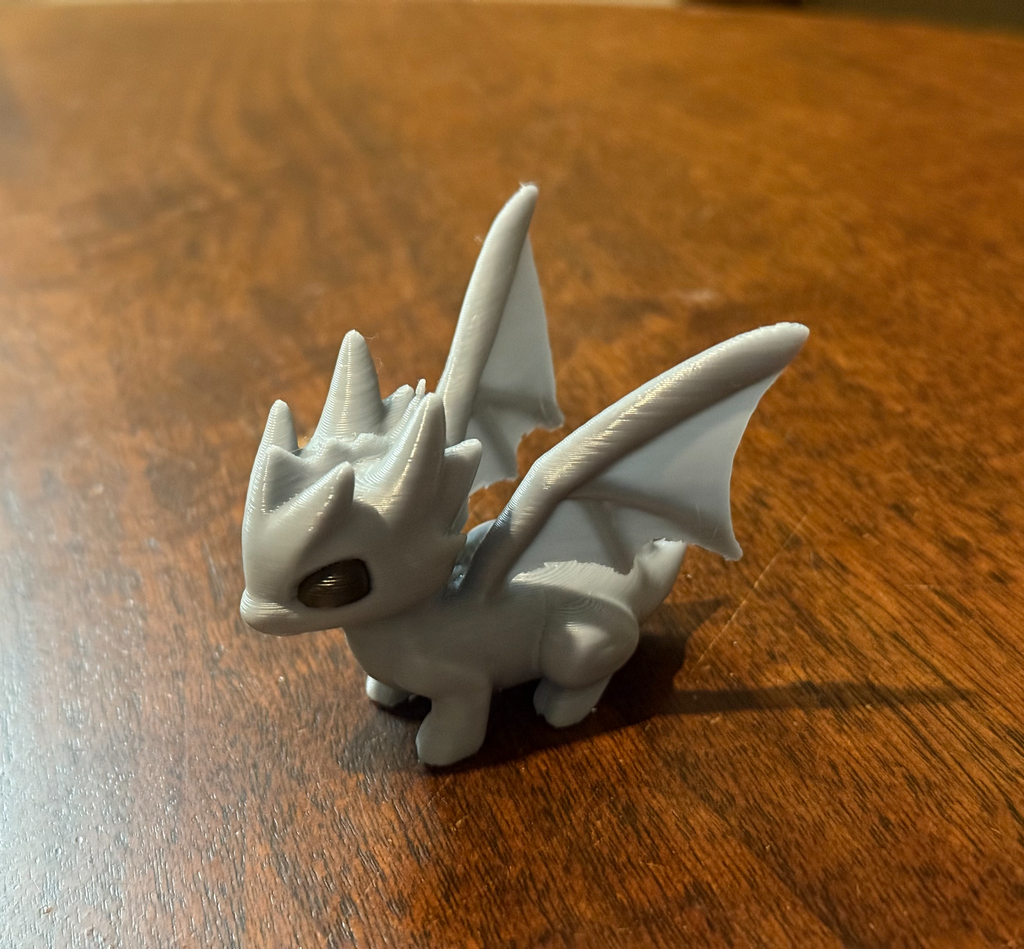 Cute squatting dragon