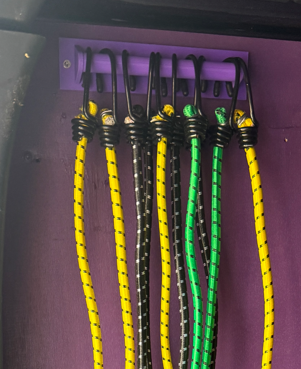Wide Hanger for Multiple Items Such as Bungee Cord