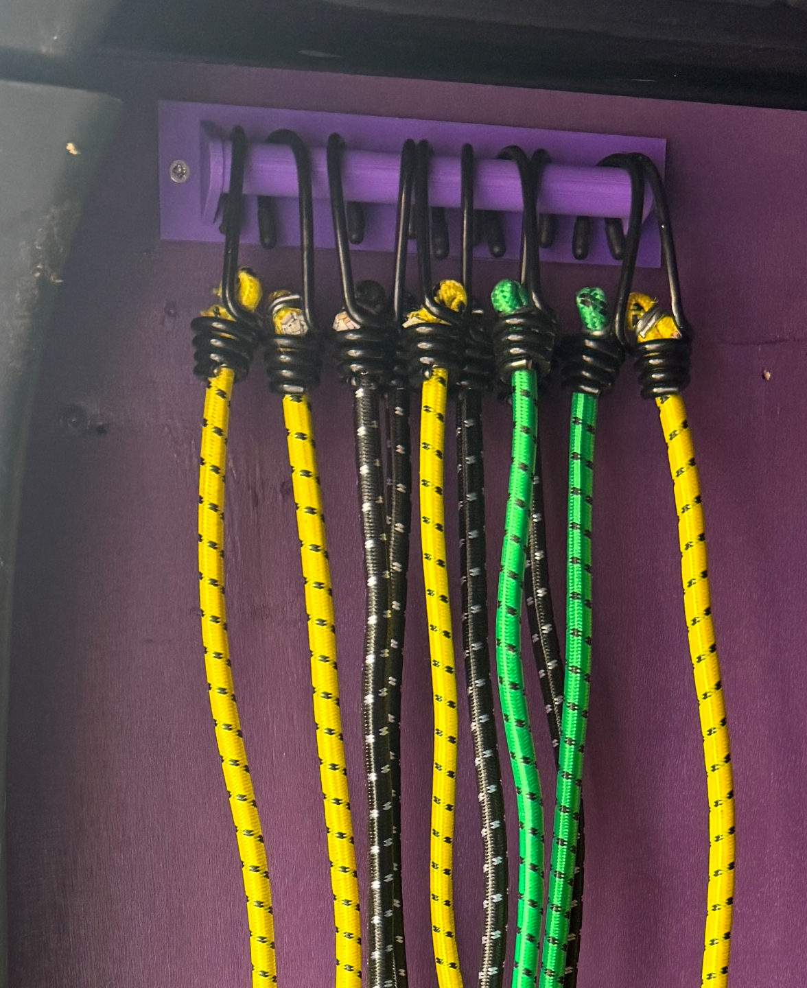Wide Hanger for Multiple Items Such as Bungee Cord