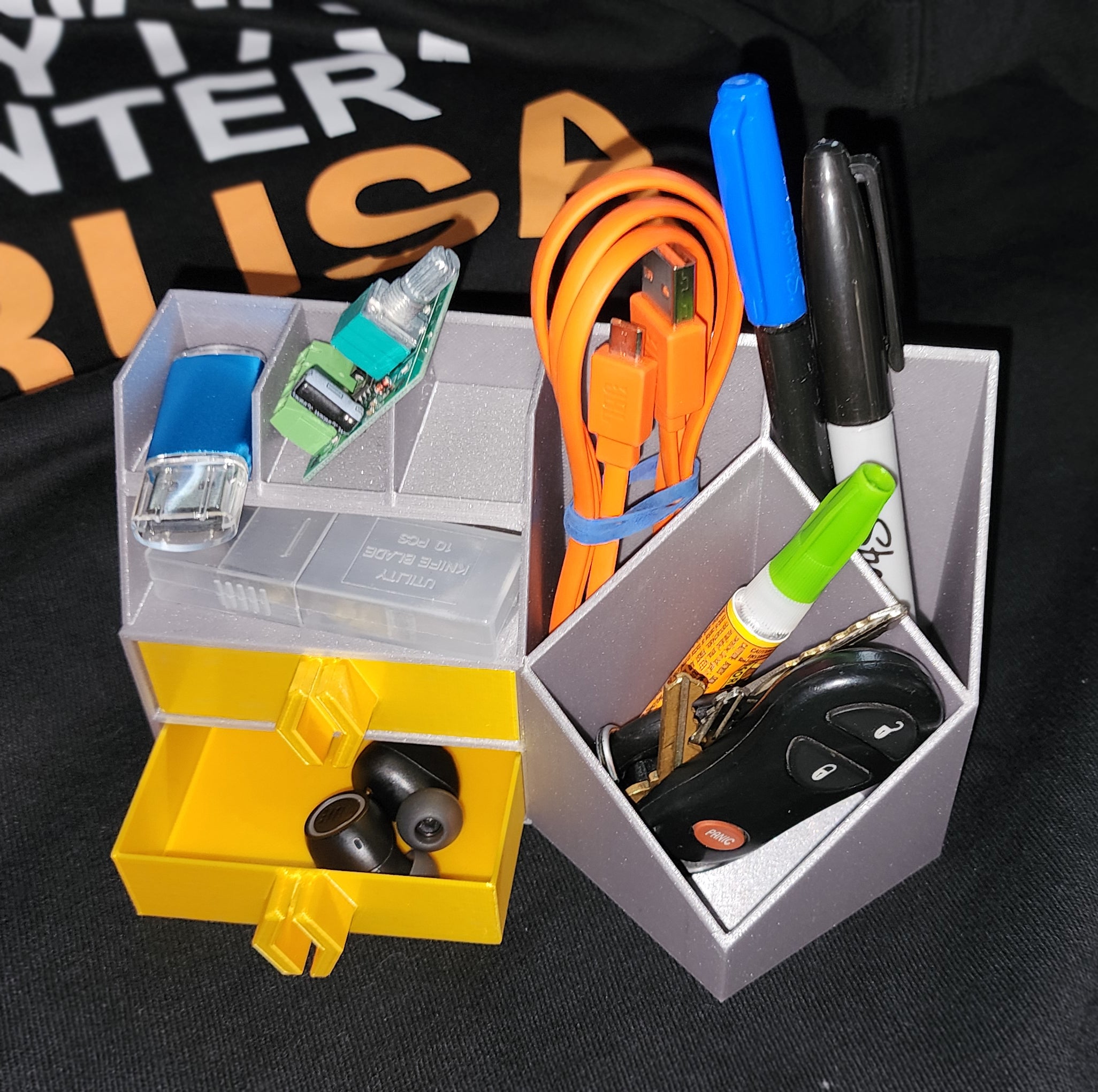 Desk organizer with drawers and caddies