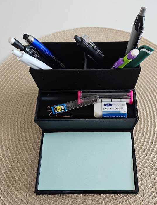 Desk organizer with a "hidden" drawer