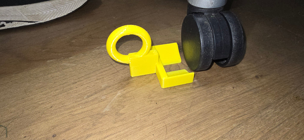 Desk chair wheel chock