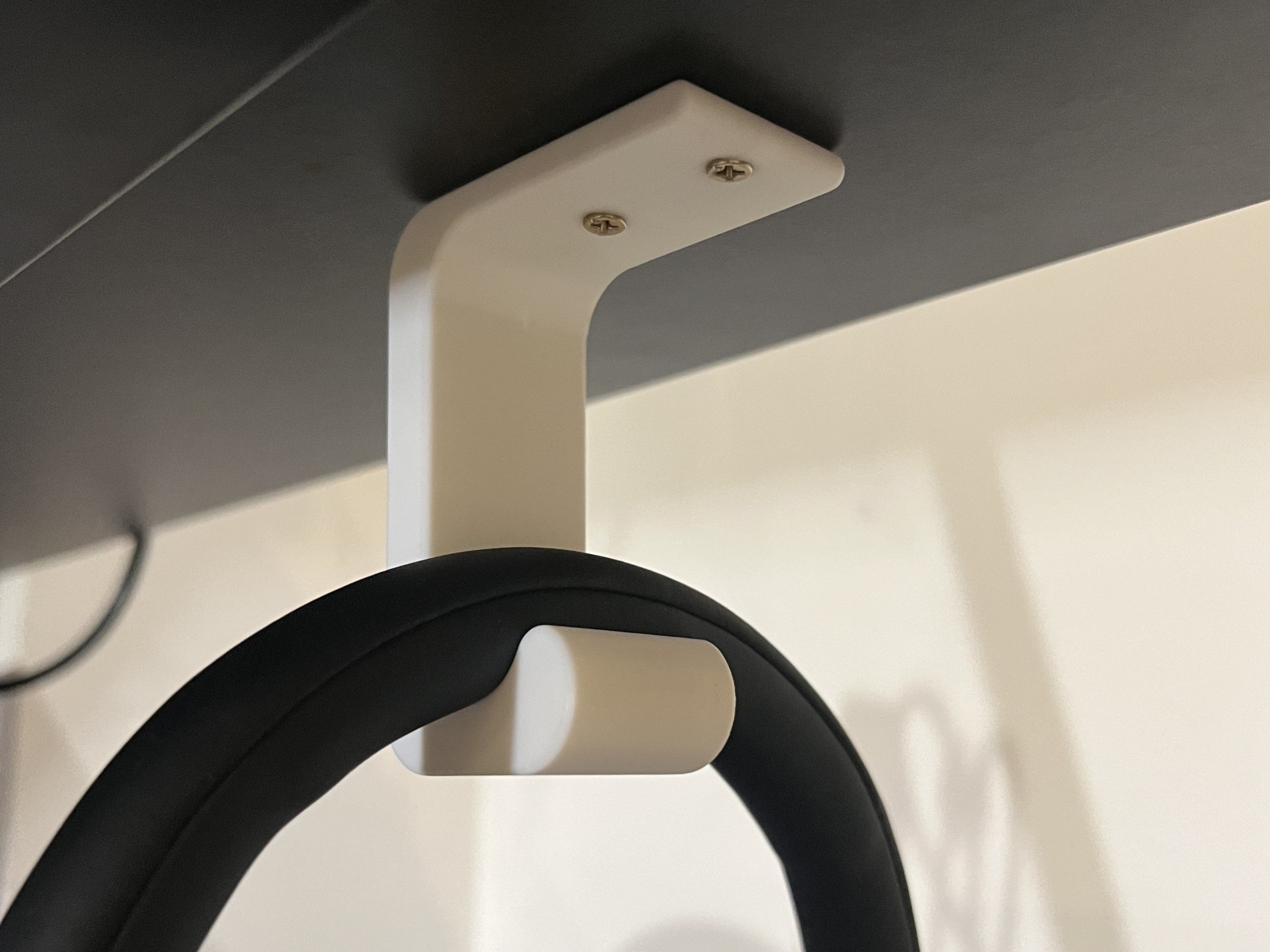 Under-desk headphone holder