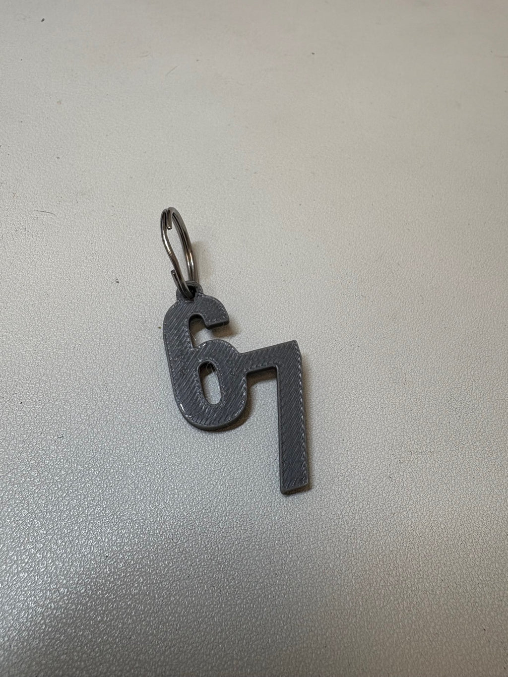 67 6 7 6-7 Keychain 1g Filament quick print
