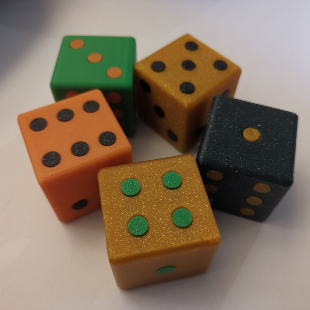 Big dice with rivets