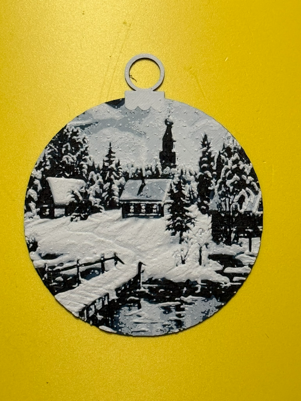 Christmas ball of a snowy landscape