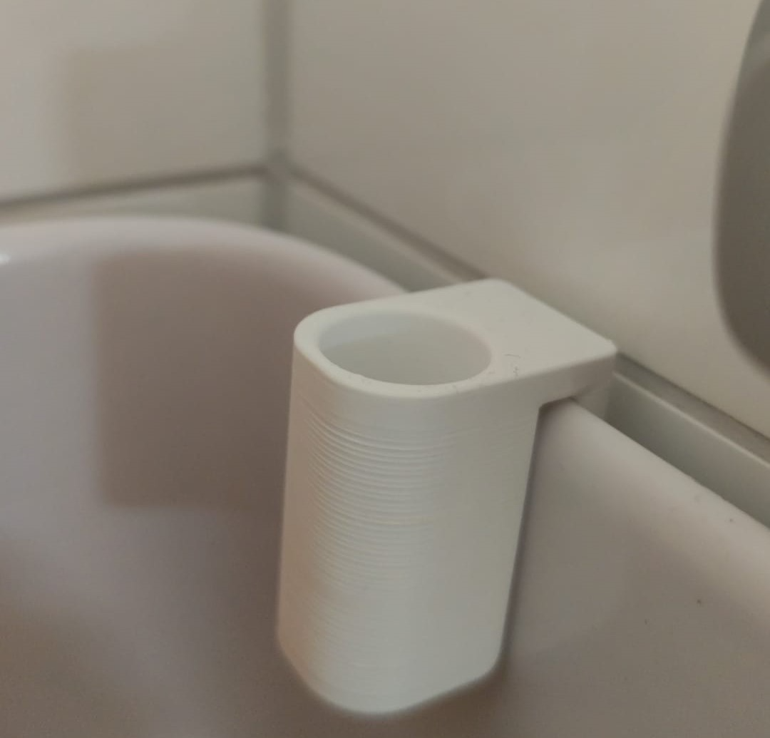 Toothbrush holder shower