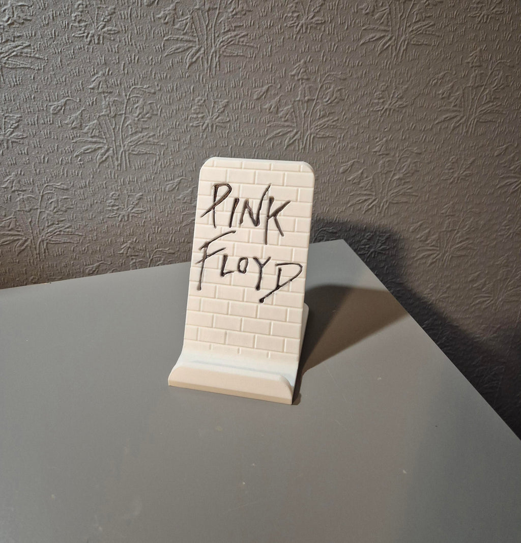 Phone stand Pink Floyd The Wall. Free to sell.